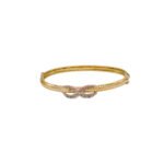 PULSO TIPO ARO INFINITO TRES OROS 18K