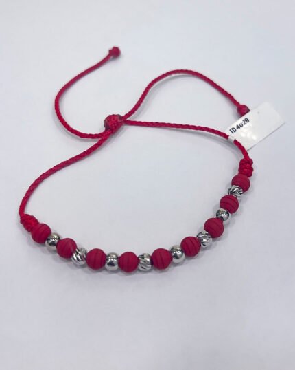 PULSO TEJIDO CON 8 BALINES DE ORO 18K CON BOLAS DE NEOPRENO EN HILO ROJO