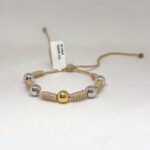 PULSO TEJIDO CON 5 BALINES EN ORO BLANCO Y AMARILLO 18K CON 6 NUDOS EN HILO BEIGE