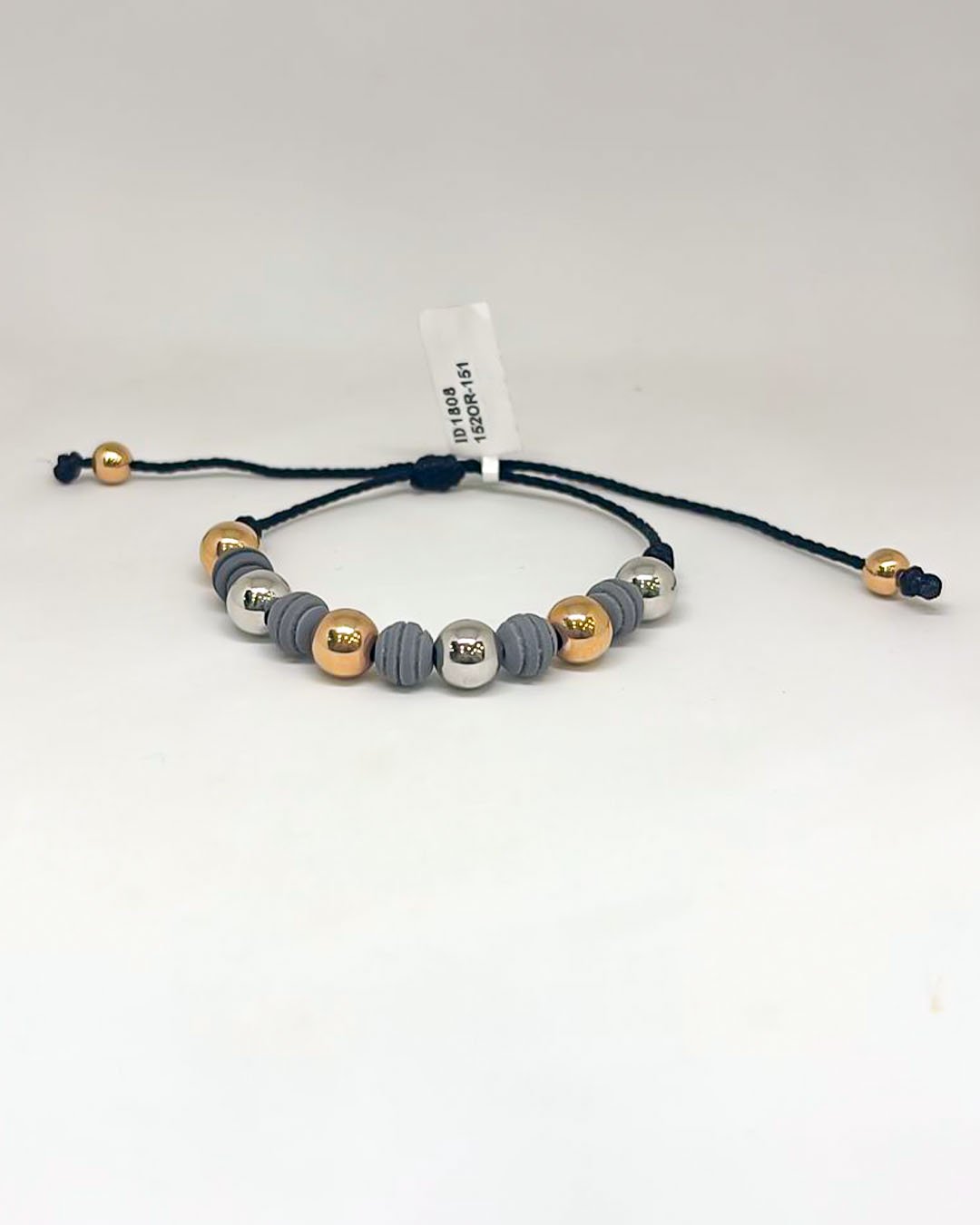 1521808.jpg PULSO TEJIDO CON 8 BALINES DE ORO 18K CON BOLAS DE NEOPRENO EN HILO NEGRO - Image 1