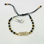 PULSO TEJIDO CON HERRAJE AUDI Y 14 BALINES DE ORO 18K CON BOLA DE NEOPRENO EN HILO NEGRO