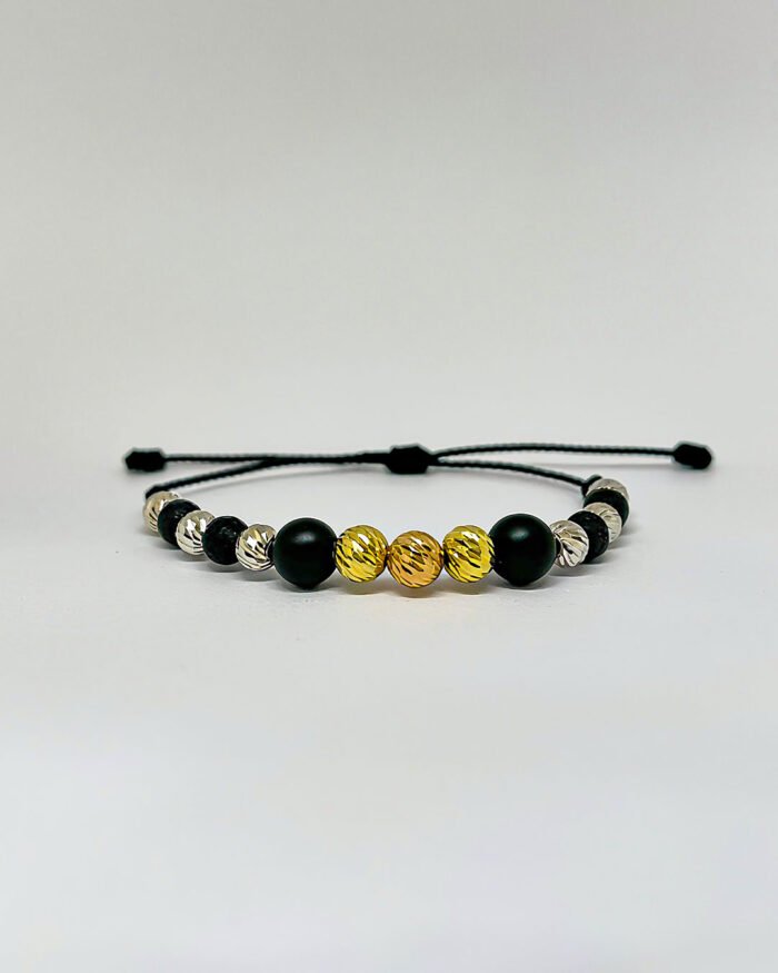 PULSO TEJIDO 9 BALINES DIAMANTADOS TRES ORO 18K CON BOLAS DE NEOPRENO EN HILO NEGRO - Image 1
