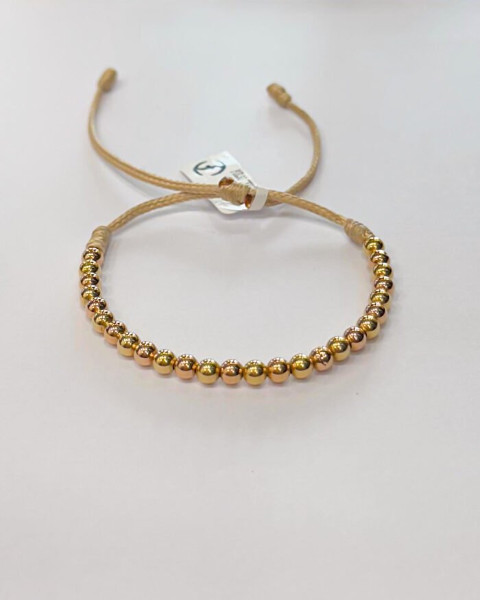 PULSO TEJIDO CON 26 BALINES DE ORO 18K EN HILO BEIGE - Image 1