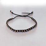 PULSO TEJIDO CON 34 BALINES DE ORO 18K EN HILO NEGRO