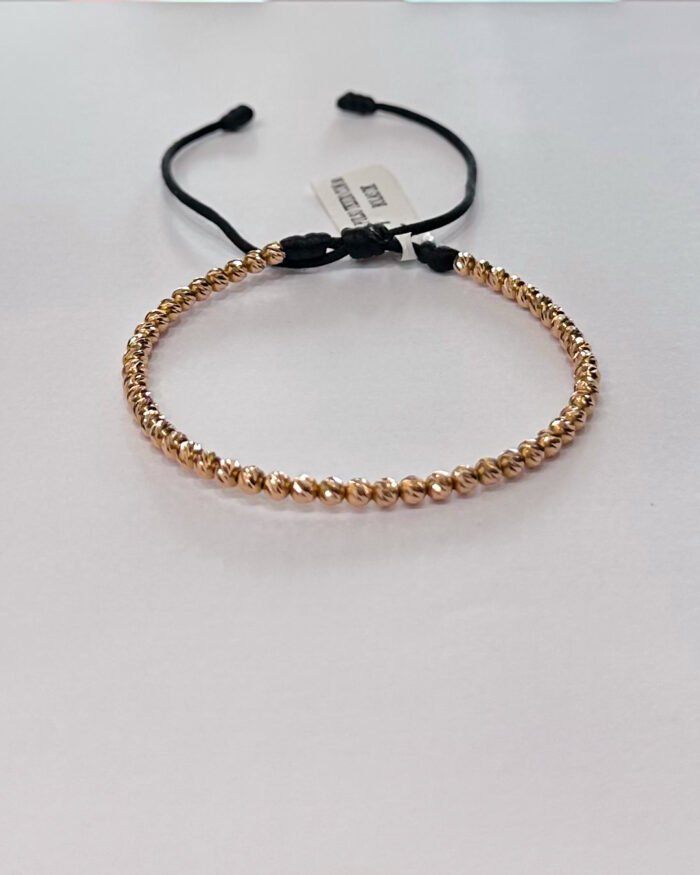 PULSO TEJIDO CON 50 BALINES DE ORO 18K EN HILO NEGRO - Image 1
