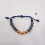 PULSO TEJIDO 4 BALINES DE ORO 18KCON BOLAS DE NEOPRENOEN HILO AZUL MARINO