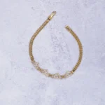 PULSO TEJIDO SEDUZA CORAZONES ORO 18K