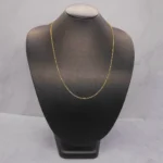 CADENA TEJIDO BANANA FINA CORTA ORO 18K