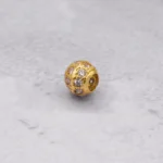 DIJE BOLA DE FUEGO ORO 18K
