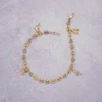 TOBILLERA GUCCI TRES OROS DIJES ORO 18K
