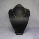 CADENA TEJIDO OJOS LINCE FINA CORTA ORO 18K