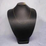 CADENA TEJIDO TRES POR UNO FINA CORTA ORO 18K