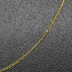 CADENA TEJIDO TRES POR UNO FINA CORTA ORO 18K - Image 2