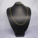 CADENA TEJIDO CUBANA BARRAS OJOS LINCE 18K