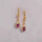 ARETES COLGANTES PIEDRAS ROJAS ORO 18K