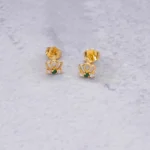 ARETES TOPO CORONA PIEDRAS 18K