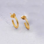 ARETES TOPOS 18K
