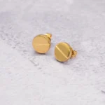 ARETES TOPOS CARTIER ORO 18K