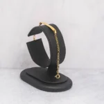 PULSO PLACA TEJIDO TRES POR UNO ORO 18K