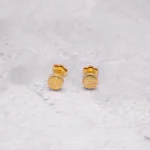 ARETES TOPOS CARTIER ORO 18K