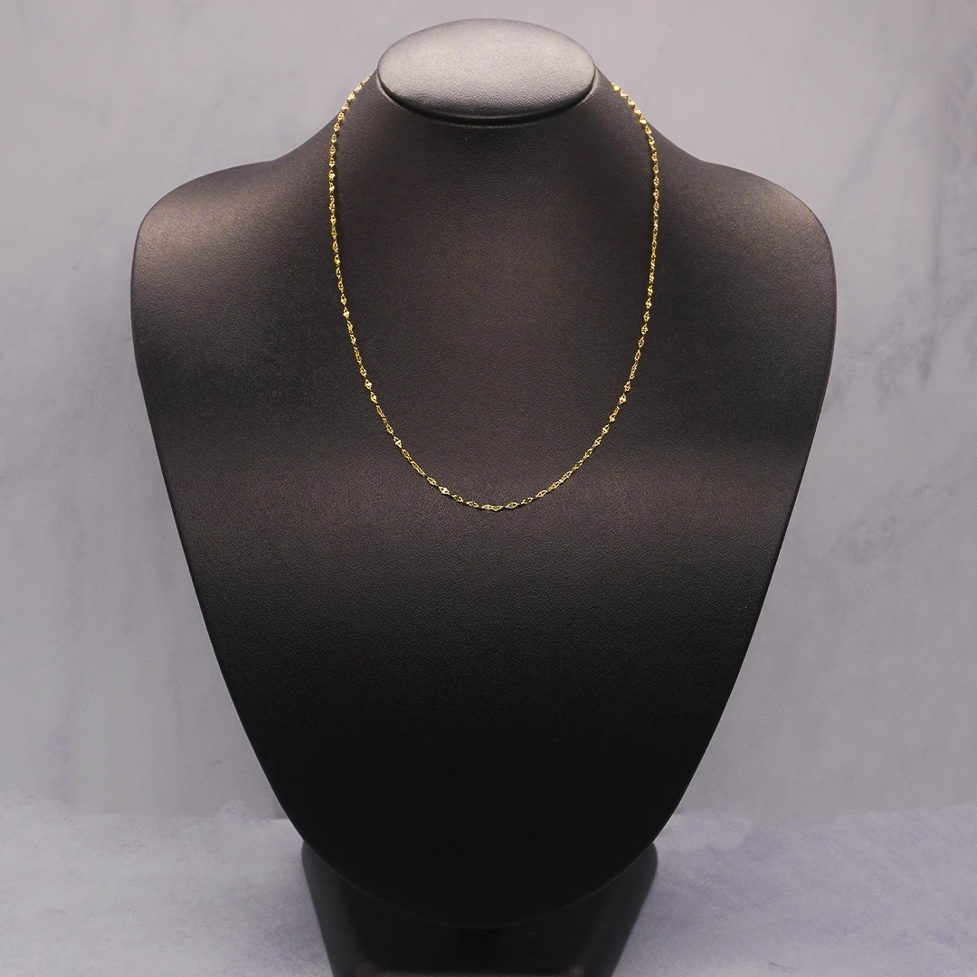 1551167.webp CADENA TEJIDO GRANO DE ARROZ CORTA ORO 18K - Image 1