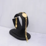 PULSO TEJIDO CHINO CON MONEDA ORO 18K