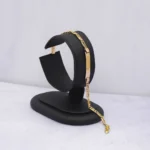 PULSO PLACA TEJIDO OJOS LINCE ORO 18K