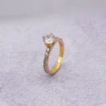 ANILLO SOLITARIO TENNIS ORO 18K