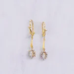 ARETES COLGANTES FLOR PIEDRAS ORO 18K
