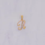 DIJE LETRA R CALADA PIEDRAS ORO 18K