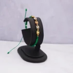 DIJE HERRAJE GUCCI TRES OROS 18K