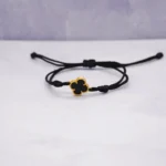 DIJE HERRAJE VAN CLEEF CON PIEDRA NEGRA 18 K