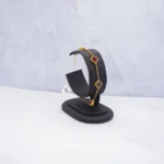 PULSO VAN CLEEF PIEDRAS ROJAS ORO 18K