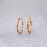 ARETES CANDONGAS TENNIS ORO 18K