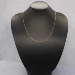 CADENA TEJIDO ROLON FINA CORTA ORO 18K