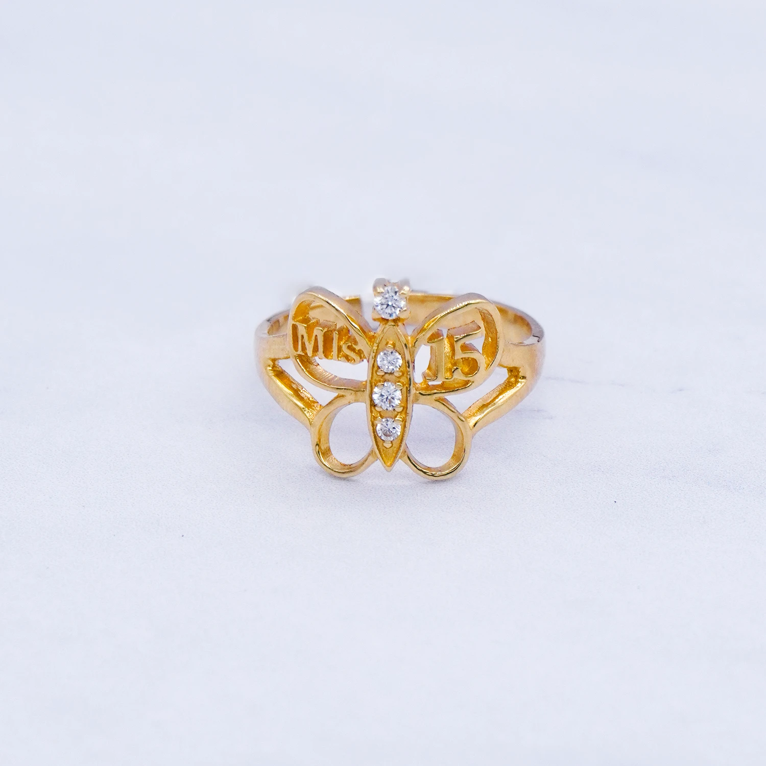 1541035.webp ANILLO MIS 15 MARIPOSA 18K - Image 1