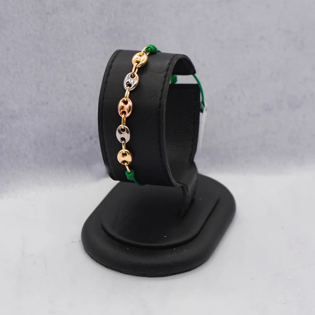 1541293.webp PULSO HERRAJE GUCCI TRES OROS 18K - Image 1