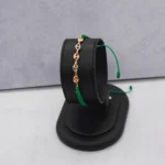 DIJE HERRAJE GUCCI TRES OROS 18K