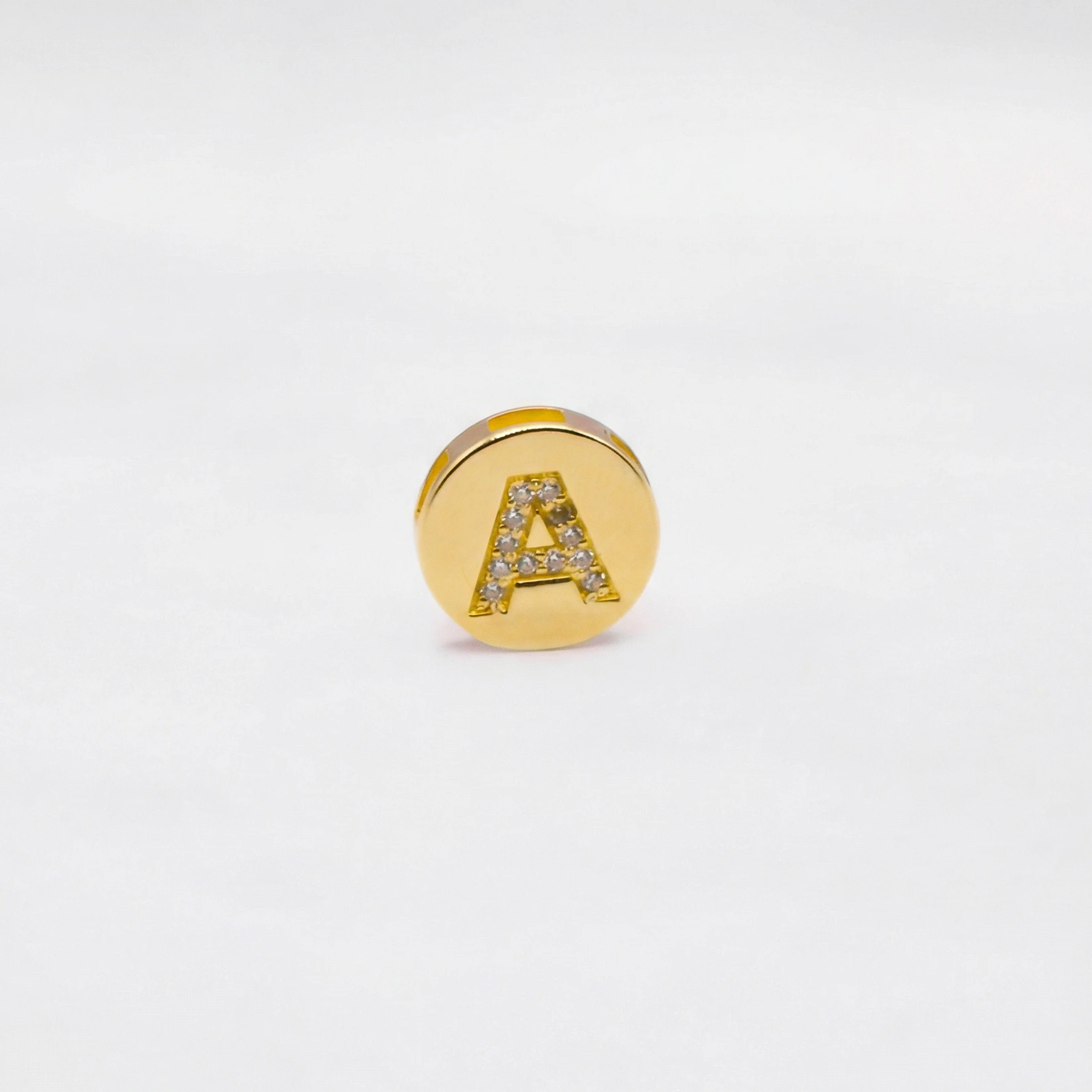 1522483.webp DIJE HERRAJE LETRA A PIEDRAS ORO 18K - Image 1