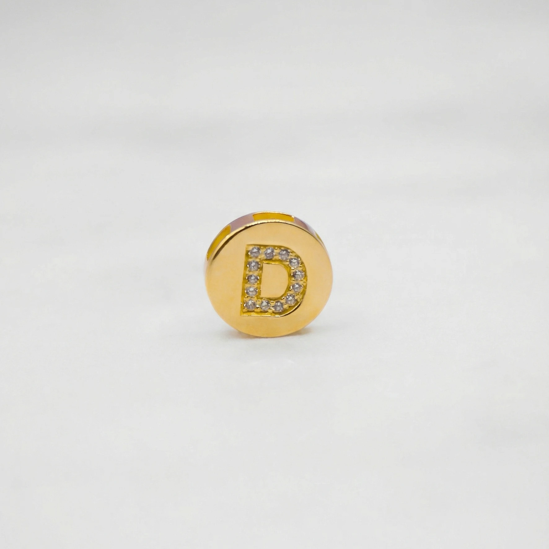 1522491.webp DIJE HERRAJE LETRA D PIEDRAS ORO 18K - Image 1