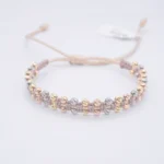 PULSO TEJIDO CON 48 BOLAS DE ORO 18K