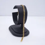 PULSO TEJIDO ESCALERA PLANO ORO 18K