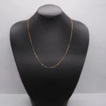 CADENA TEJIDO GRANO DE ARROZ 18K