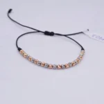PULSO TEJIDO CON 24 BALINES ORO 18K