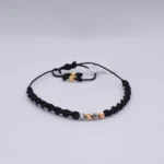 PULSO TEJIDO CON6 BALINES ORO 18K