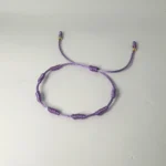 PULSO TEJIDO CON 7 NUDOS EN COLOR LILA CON 2 BALINES DE ORO 18K