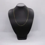 CADENA TEJIDO GRANO DE ARROZ 18K