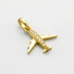 DIJE AVION PIEDRAS 18K