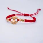 PULSO TEJIDO ESLABON GUCCI CUATRO BOLAS ORO 18K