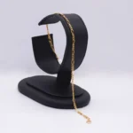 PULSO TEJIDO TRES POR UNO ORO 18K
